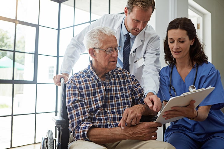 http://doctor-nurse-old-man-wheelchair-with-clipboard-healing-medical-consulting-conversation-paperwork-recovery-senior-person-with-disability-hospital-rehabilitation-advice_590464-567148