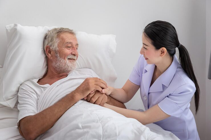 http://happy-nurse-holding-elderly-man-hands-with-blanket-bedroom-nursing-home_554837-215