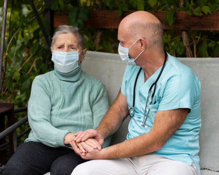 male-nurse-holding-senior-woman-s-hands_23-2148757720