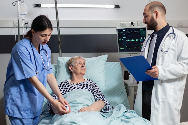 medical-nurse-attaching-oxymeter-senior-woman-patient_482257-6434