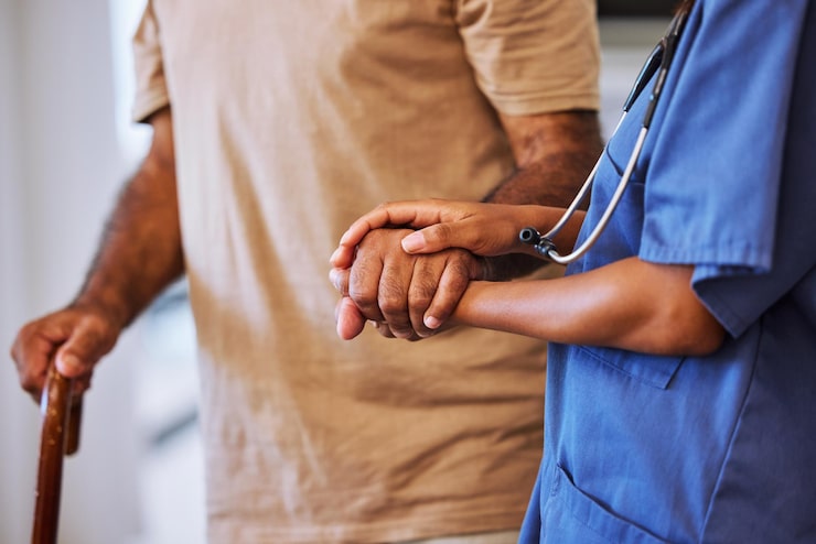 http://support-trust-help-from-caregiver-nurse-walking-with-senior-man-patient-retirement-home-with-healthcare-insurance-hands-female-medical-worker-alzheimers-male-with-hospice-care_590464-85944%20(1)