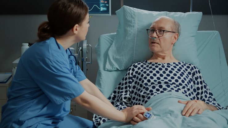 http://nurse-from-hospital-ward-tends-sick-old-patient-bed_482257-16848